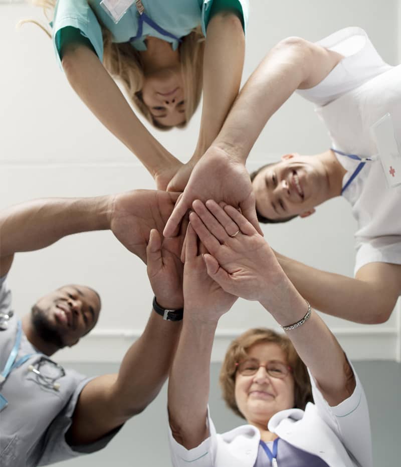 Researchers work together to complete clinical trials